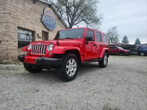 Red 2016 Jeep Wrangler Sahara for sale in Wanatah, IN