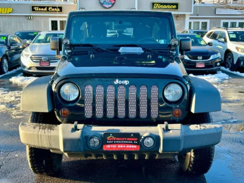 Another view of 2012 Jeep Wrangler Unlimited Sport SUV 4D for sale in East Stroudsburg, PA at Auto Valley Group