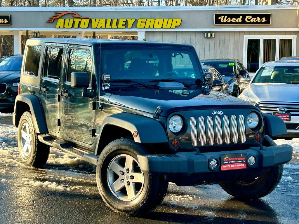 Green 2012 Jeep Wrangler Unlimited Sport SUV 4D for sale in East Stroudsburg, PA