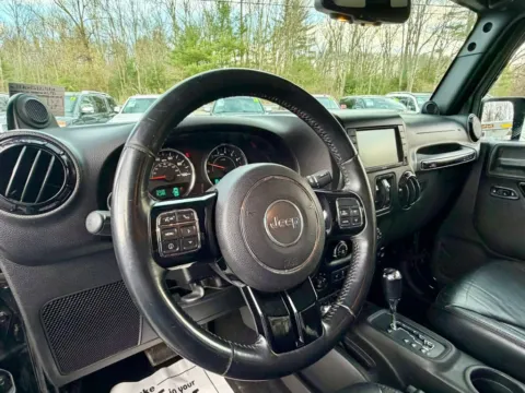 Photos of 2014 Jeep Wrangler Unlimited Altitude Sport Utility 4D for sale in East Stroudsburg, PA at Auto Valley Group