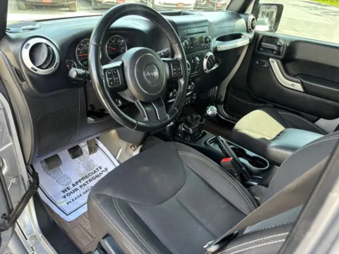 Photos of 2015 Jeep Wrangler Unlimited Sahara Sport Utility 4D for sale in East Stroudsburg, PA at Auto Valley Group