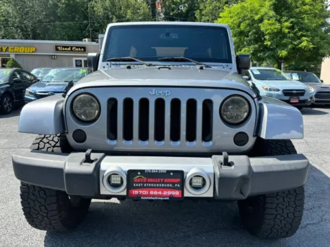 Another view of 2015 Jeep Wrangler Unlimited Sahara Sport Utility 4D for sale in East Stroudsburg, PA at Auto Valley Group