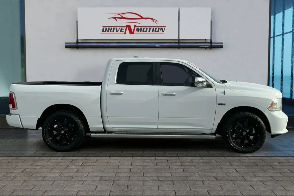Photos of 2013 Ram 1500 Crew Cab Laramie Longhorn Limited Edition Pickup 4D 5 1/2 ft for sale in Rio Rancho, NM at Drive N-Motion Rio Rancho
