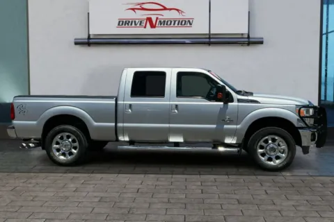 Another view of 2012 Ford F250 Super Duty Crew Cab Lariat Pickup 4D 6 3/4 ft for sale in Rio Rancho, NM at Drive N-Motion Rio Rancho