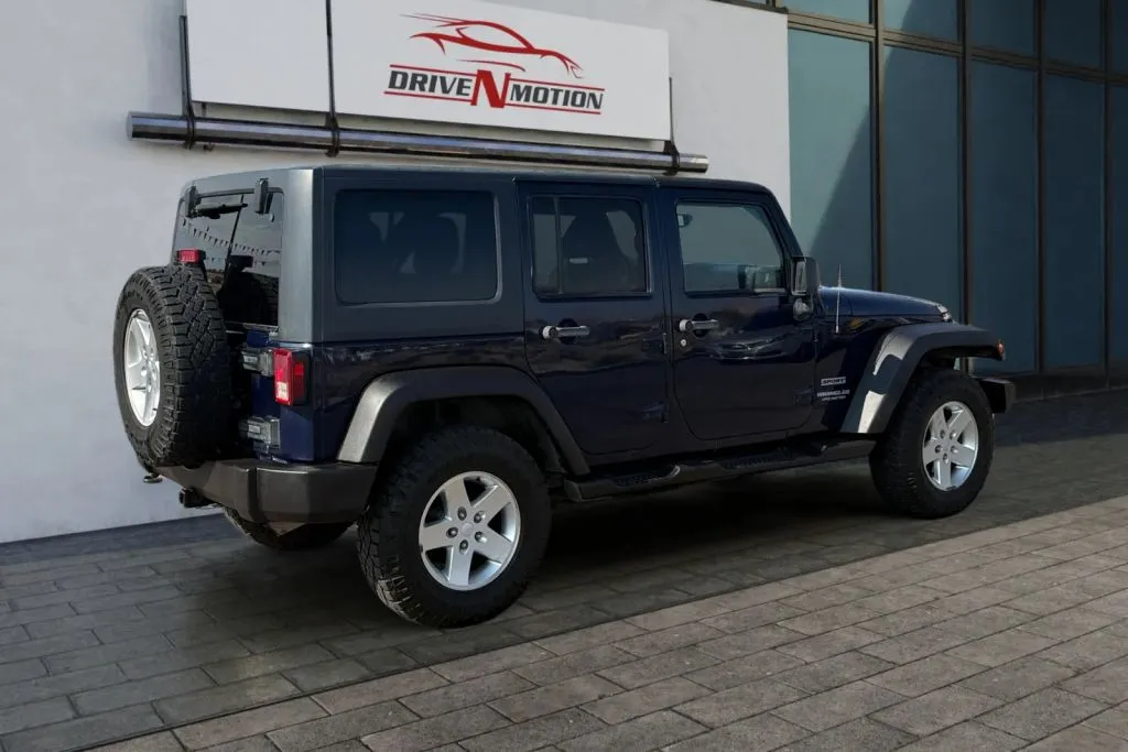 More photos of 2013 Jeep Wrangler Unlimited Sport SUV 4D at Drive N-Motion Rio Rancho, NM