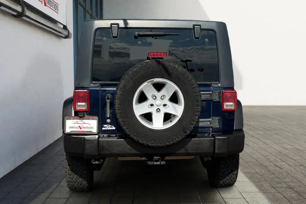 More photos of 2013 Jeep Wrangler Unlimited Sport SUV 4D at Drive N-Motion Rio Rancho, NM