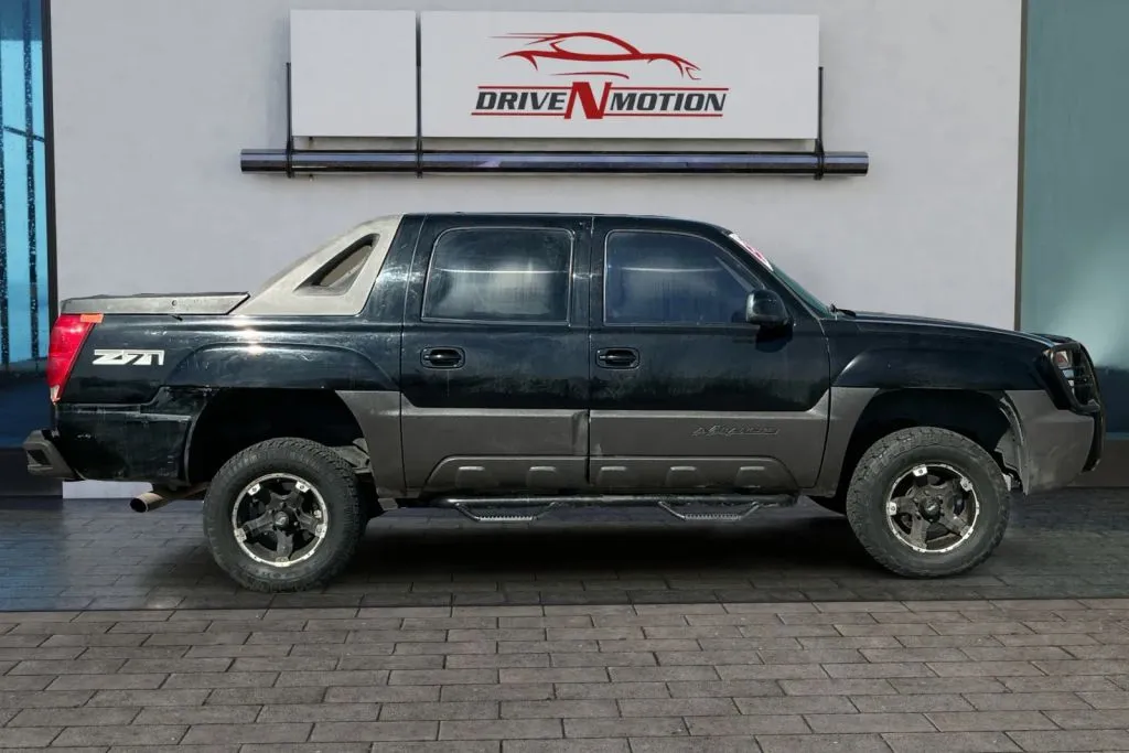 Another view of 2004 Chevrolet Avalanche 1500 Sport Utility Pickup 4D 5 1/4 ft for sale in Rio Rancho, NM at Drive N-Motion Rio Rancho
