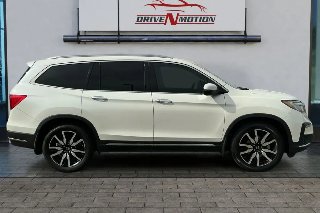 Another view of 2019 Honda Pilot Touring Sport Utility 4D for sale in Rio Rancho, NM at Drive N-Motion Rio Rancho