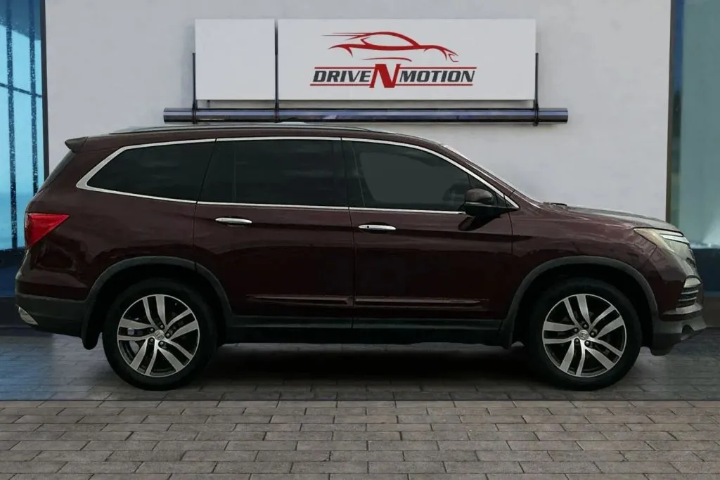 Photos of 2016 Honda Pilot Elite Sport Utility 4D for sale in Rio Rancho, NM at Drive N-Motion Rio Rancho