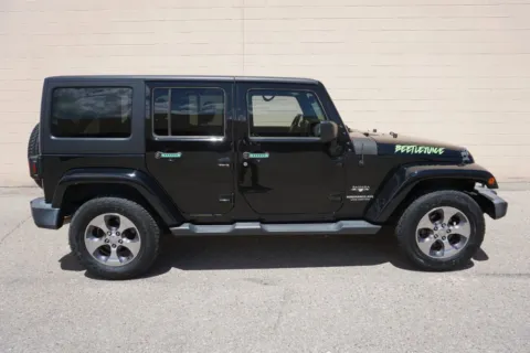 Another view of 2016 Jeep Wrangler Unlimited Sahara Sport Utility 4D for sale in Rio Rancho, NM at Drive N-Motion Rio Rancho