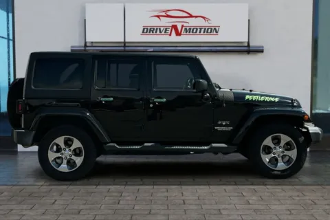 Photos of 2016 Jeep Wrangler Unlimited Sahara Sport Utility 4D for sale in Rio Rancho, NM at Drive N-Motion Rio Rancho