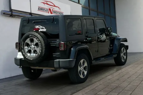 Another view of 2016 Jeep Wrangler Unlimited Sahara Sport Utility 4D for sale in Rio Rancho, NM at Drive N-Motion Rio Rancho