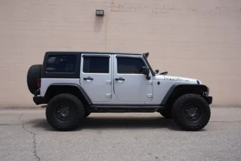 Another view of 2012 Jeep Wrangler Unlimited Sport SUV 4D for sale in Rio Rancho, NM at Drive N-Motion Rio Rancho