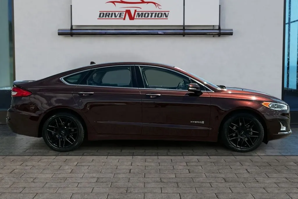 Photos of 2019 Ford Fusion Titanium Hybrid Sedan 4D for sale in Rio Rancho, NM at Drive N-Motion Rio Rancho