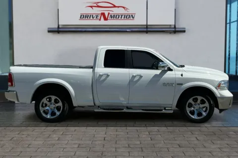 Another view of 2017 Ram 1500 Quad Cab Laramie Pickup 4D 6 1/3 ft for sale in Rio Rancho, NM at Drive N-Motion Rio Rancho