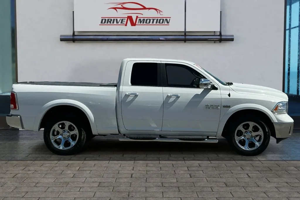 Another view of 2017 Ram 1500 Quad Cab Laramie Pickup 4D 6 1/3 ft for sale in Rio Rancho, NM at Drive N-Motion Rio Rancho