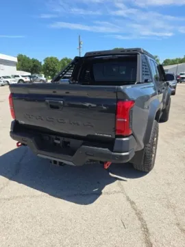 More photos of 2024 Toyota Tacoma Hybrid Trailhunter at Quality Motors Chrysler Dodge Jeep Ram, KS