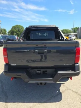 More photos of 2024 Toyota Tacoma Hybrid Trailhunter at Quality Motors Chrysler Dodge Jeep Ram, KS