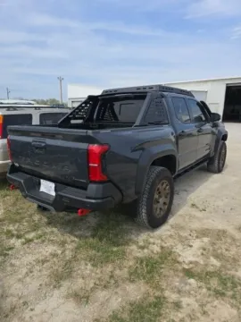 More photos of 2024 Toyota Tacoma Hybrid Trailhunter at Quality Motors Chrysler Dodge Jeep Ram, KS