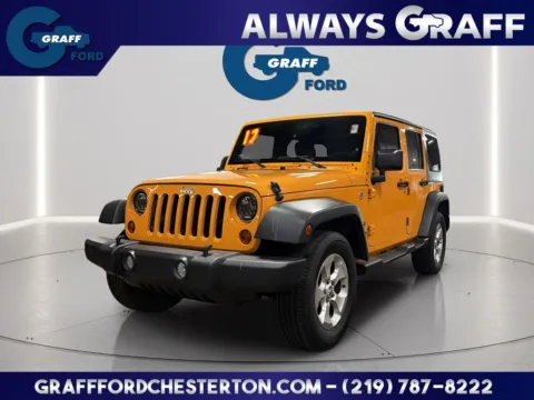 Orange 2012 Jeep Wrangler Unlimited Sport for sale in Chesterton, IN