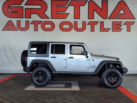 Silver 2014 Jeep Wrangler Unlimited Sport for sale in Gretna, NE
