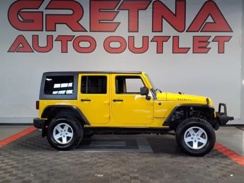 Yellow 2011 Jeep Wrangler Unlimited Rubicon for sale in Gretna, NE