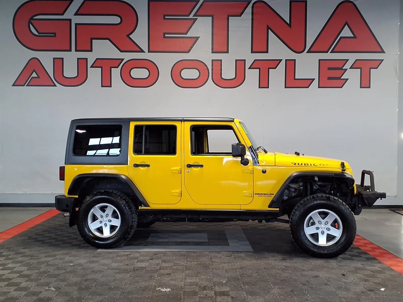 Yellow 2011 Jeep Wrangler Unlimited Rubicon for sale in Gretna, NE