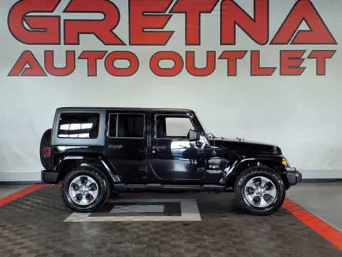 Black 2017 Jeep Wrangler Unlimited Sahara for sale in Gretna, NE