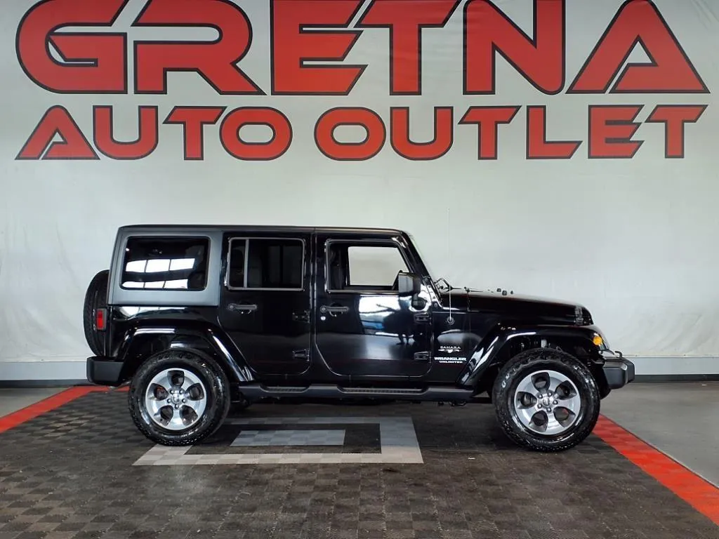 Black 2017 Jeep Wrangler Unlimited Sahara for sale in Gretna, NE