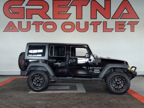 Black 2015 Jeep Wrangler Unlimited Sport for sale in Gretna, NE