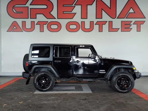 Black 2016 Jeep Wrangler Unlimited Sport S for sale in Gretna, NE