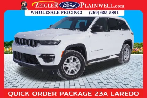 Yellow 2023 Jeep Grand Cherokee Laredo for sale in Plainwell, MI