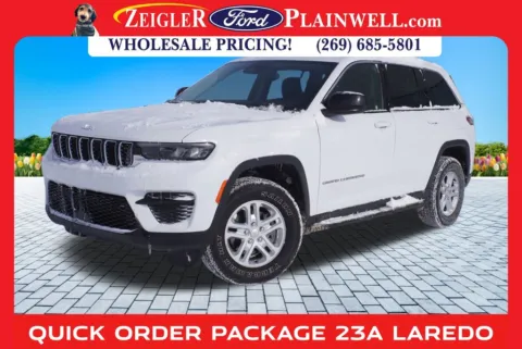 Yellow 2023 Jeep Grand Cherokee Laredo for sale in Plainwell, MI