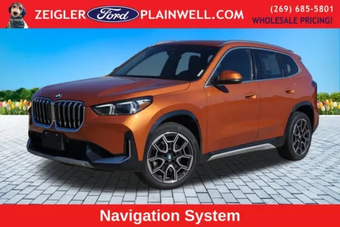 Orange 2025 BMW X1 xDrive28i for sale in Plainwell, MI