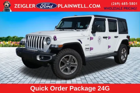 Orange 2021 Jeep Wrangler Unlimited Sahara for sale in Plainwell, MI