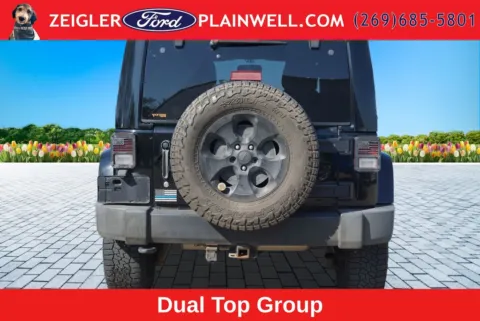 More photos of 2014 Jeep Wrangler Unlimited Sahara at Zeigler Ford of Plainwell, MI