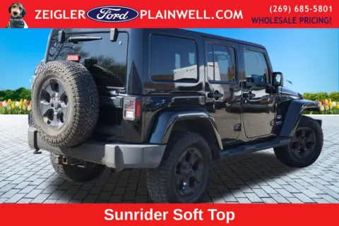 More photos of 2014 Jeep Wrangler Unlimited Sahara at Zeigler Ford of Plainwell, MI
