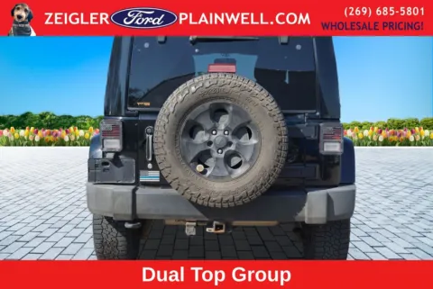 More photos of 2014 Jeep Wrangler Unlimited Sahara at Zeigler Ford of Plainwell, MI