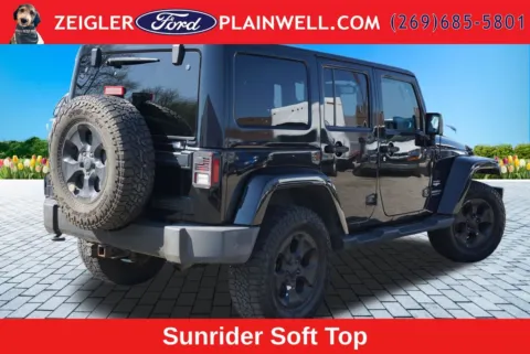 More photos of 2014 Jeep Wrangler Unlimited Sahara at Zeigler Ford of Plainwell, MI
