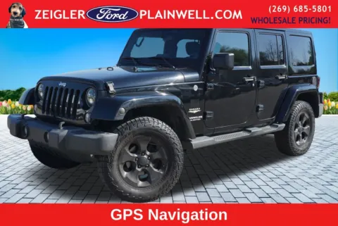 Black 2014 Jeep Wrangler Unlimited Sahara for sale in Plainwell, MI