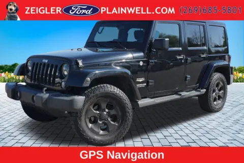 Black 2014 Jeep Wrangler Unlimited Sahara for sale in Plainwell, MI