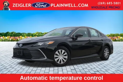 Black 2024 Toyota Camry Hybrid LE for sale in Plainwell, MI