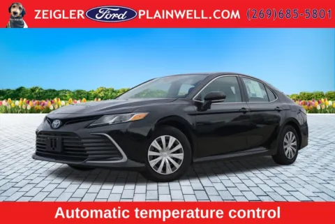 Black 2024 Toyota Camry Hybrid LE for sale in Plainwell, MI