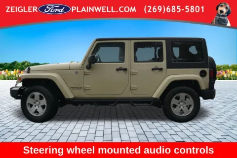 Photos of 2011 Jeep Wrangler Unlimited Sahara for sale in Plainwell, MI at Zeigler Ford of Plainwell