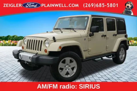 Brown 2011 Jeep Wrangler Unlimited Sahara for sale in Plainwell, MI
