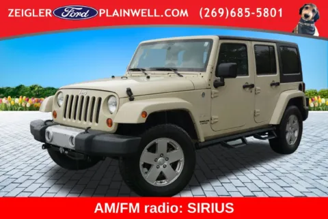 Brown 2011 Jeep Wrangler Unlimited Sahara for sale in Plainwell, MI