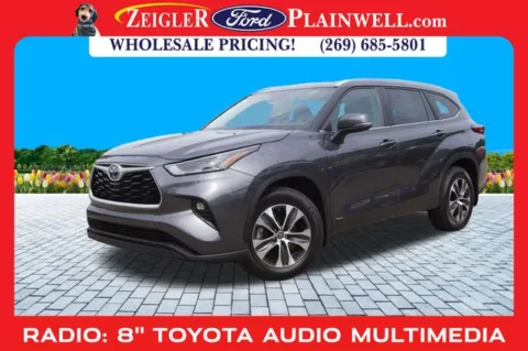 Gray 2023 Toyota Highlander Hybrid XLE for sale in Plainwell, MI
