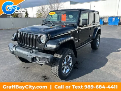 Black 2018 Jeep Wrangler Unlimited Sahara for sale in Bay City, MI