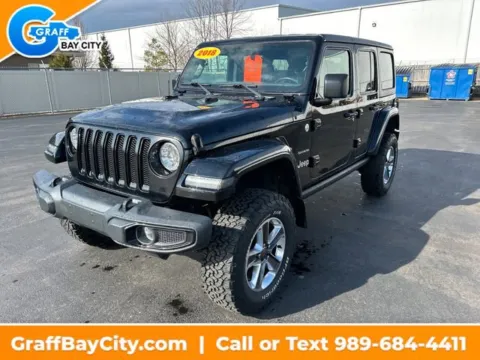 Black 2018 Jeep Wrangler Unlimited Sahara for sale in Bay City, MI