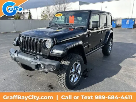 Black 2018 Jeep Wrangler Unlimited Sahara for sale in Bay City, MI